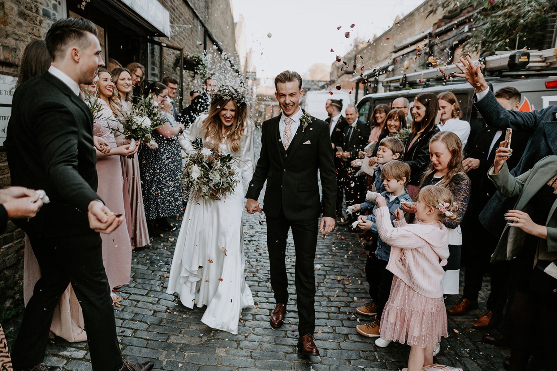 Our bride Izzie wearing our silk Olsen wedding dress