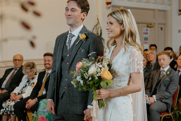 Bride Luci wearing her bespoke wedding dress