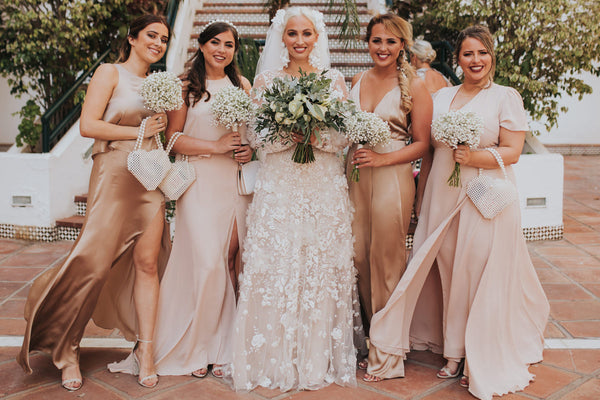 Mix-and-match champagne and blush bridesmaid dresses