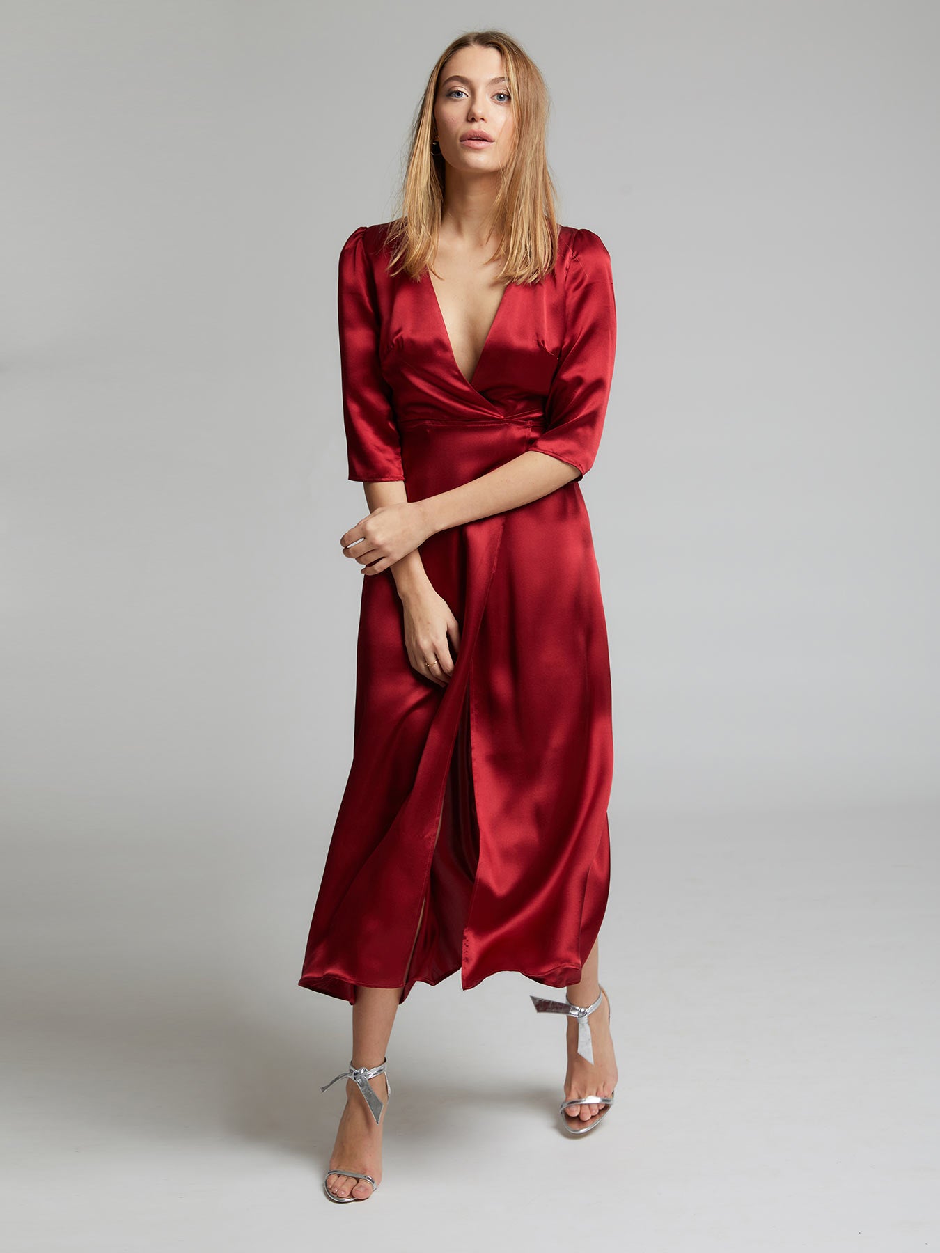 The Diana evening and occasion dress in deep red worn by Heloise Agostinelli. Made from 100% silk