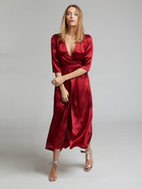 The Diana evening and occasion dress in deep red worn by Heloise Agostinelli. Made from 100% silk