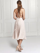 The Eloise midi wrap dress in nude colour worn by Heloise Agostinelli