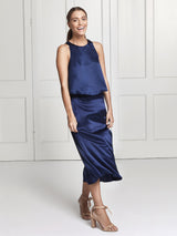 The Eve midi silk skirt and top set in blue worn by Heloise Agostinelli