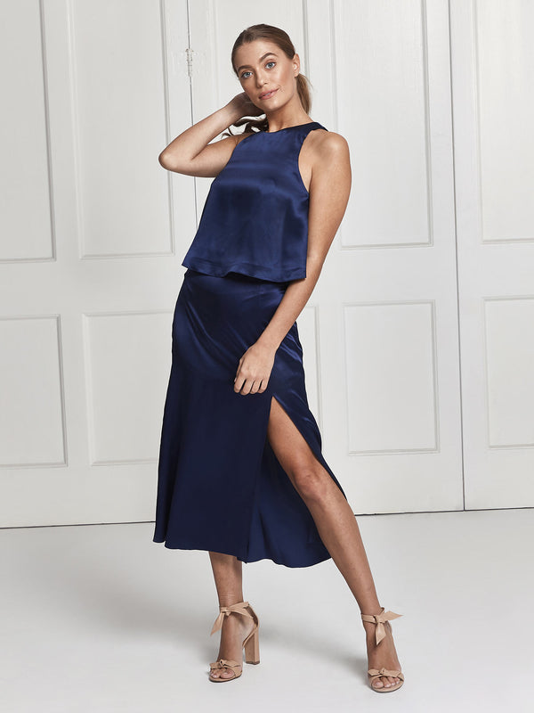 The Eve midi silk skirt and top set in blue worn by Heloise Agostinelli