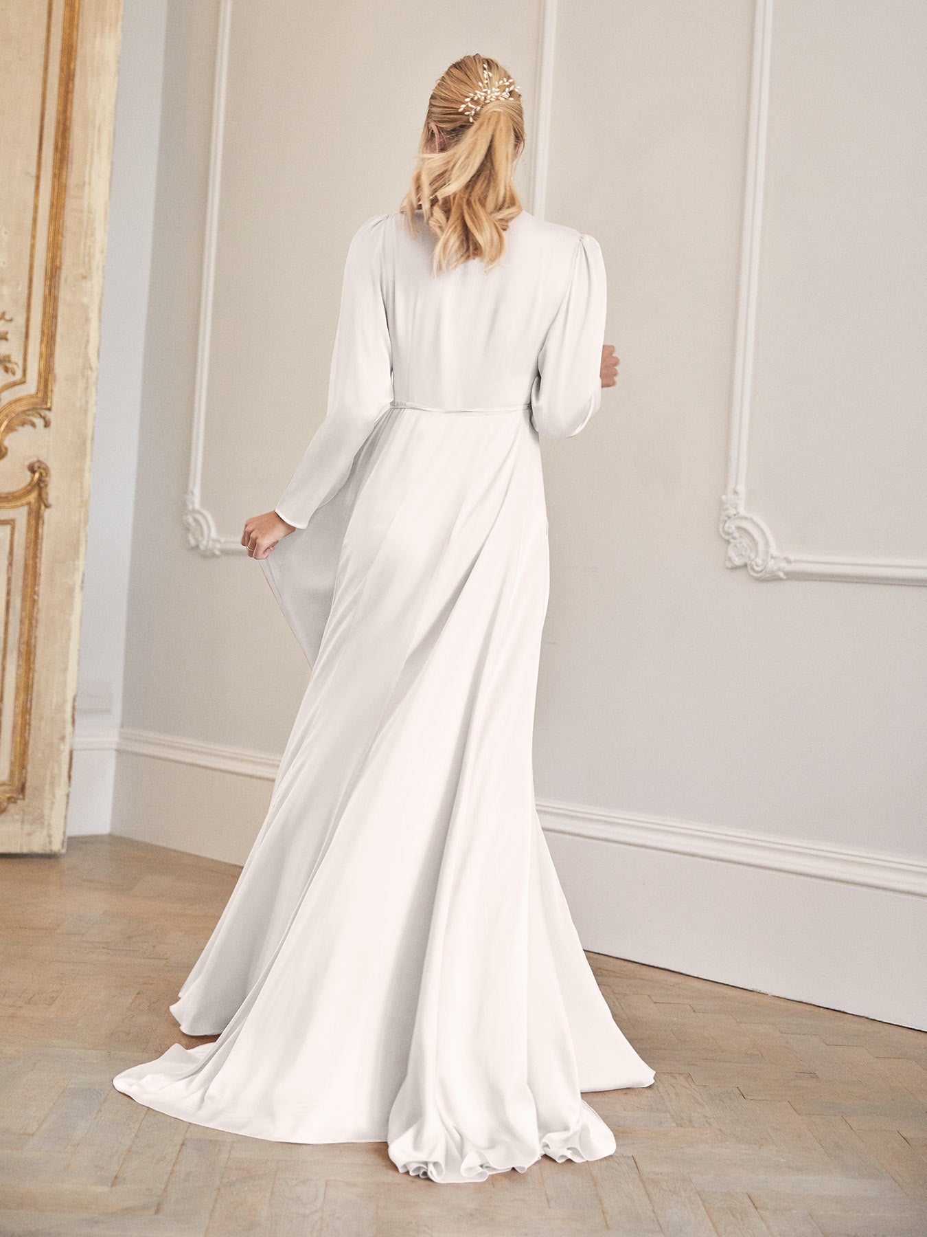 The Evie wrap wedding dress worn by Amy Neville