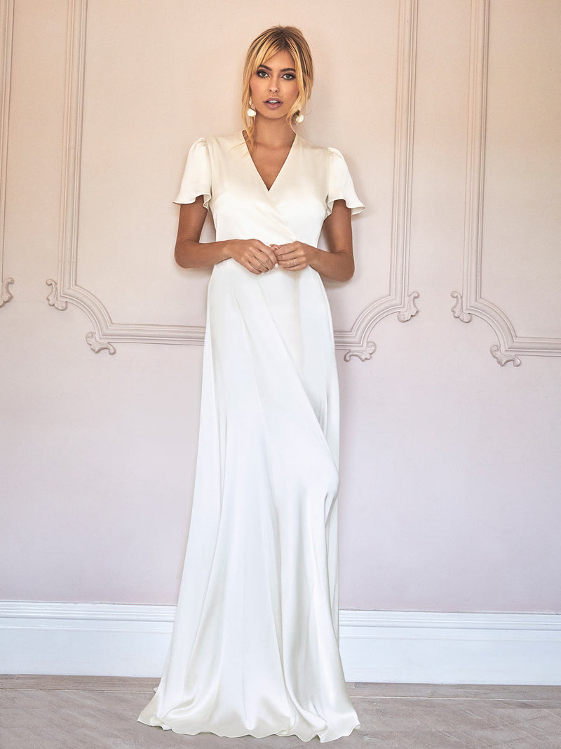 The Harriet Wedding Dress is a beautiful bride gown made from our luxe heavy-weight ivory silk in our London studio.